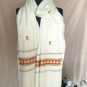 Handwoven creamy white cashmere shawl, displayed on a mannequin.