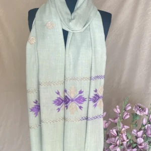 Handwoven pink and purple embroidered cashmere shawl, displayed on a mannequin.