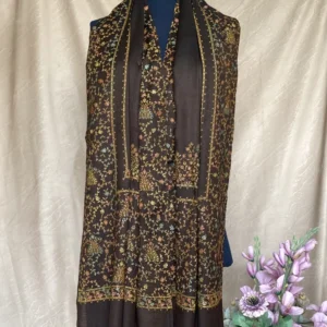 Handwoven rich brown cashmere scarf, displayed on a mannequin.