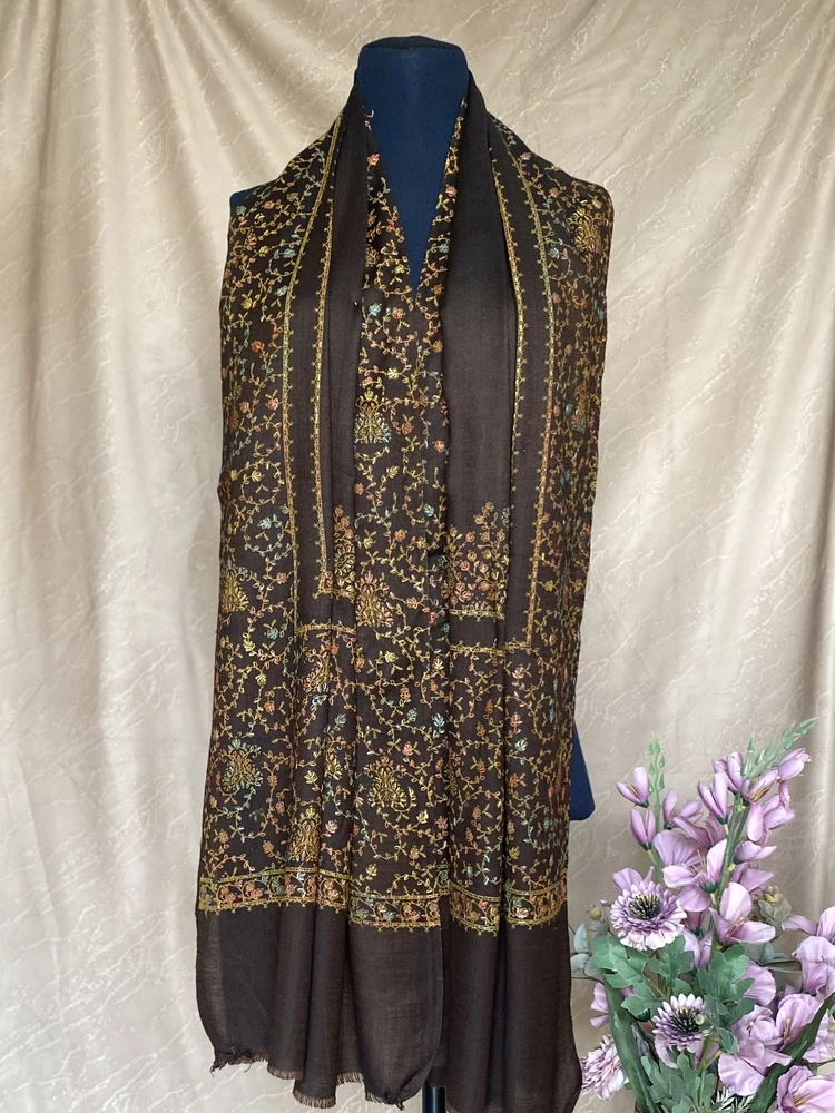 Handwoven rich brown cashmere scarf, displayed on a mannequin.